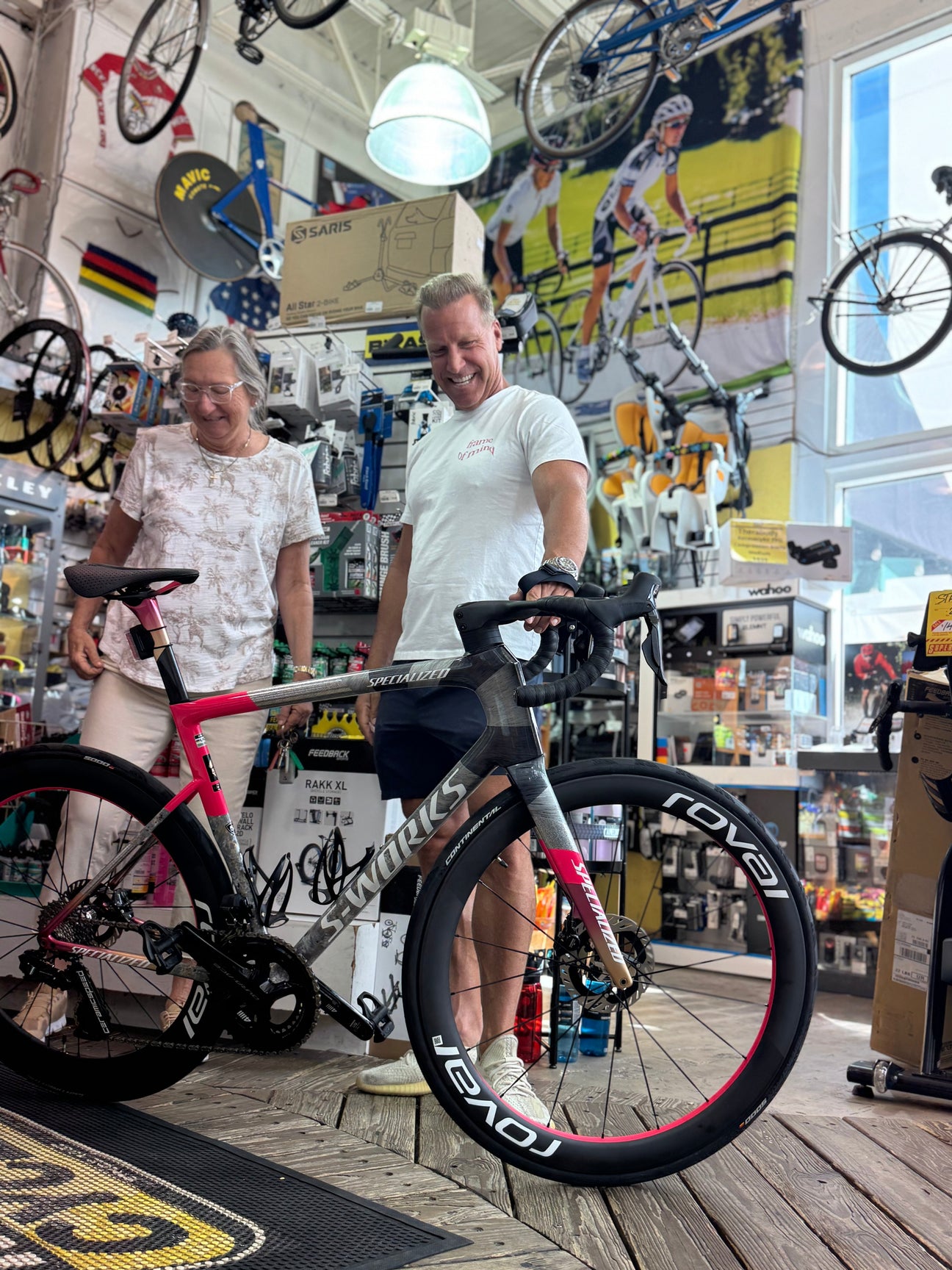 Scott patsiga with his new S-works tarmac SL8  LTD- FWD 50 limited Edition road bike inside of Mack Cycle in Miami with Mary Jane Mark (the owner)