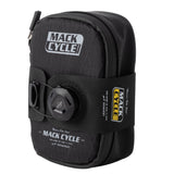 Angled front view showing full mack cycle seat bag profile with branding and dial strap system
